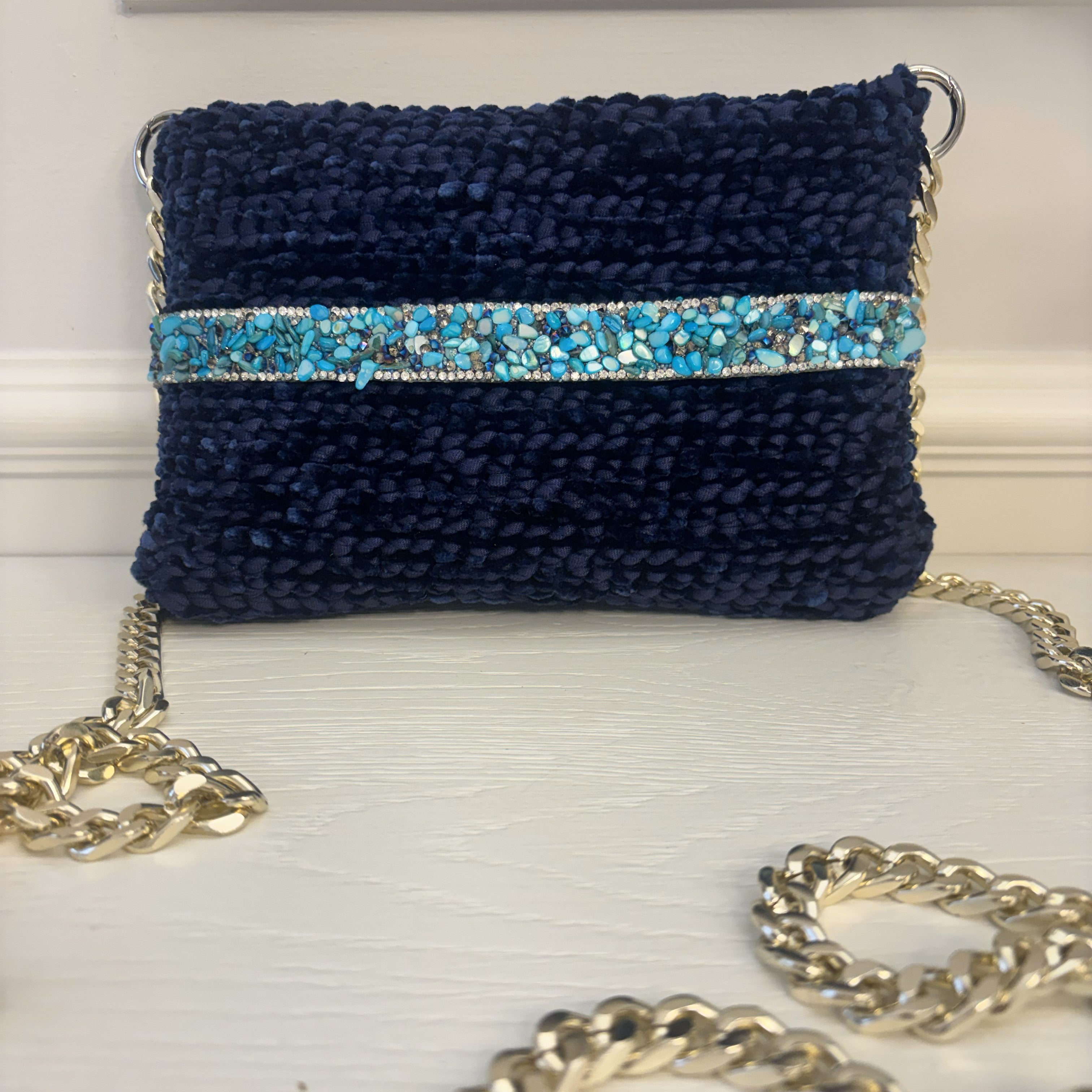 Borsa Turquoise Crystal blu scuro con fascia luminosa